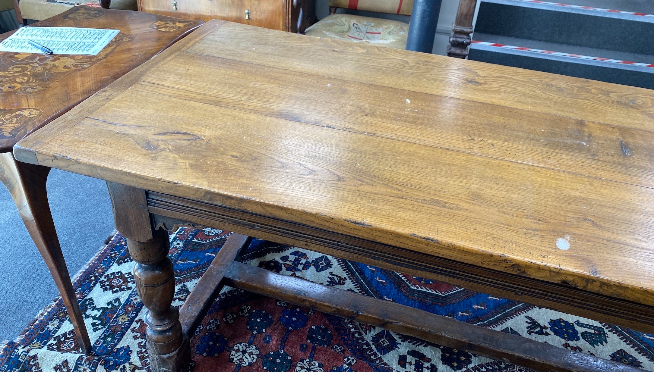 An 18th century style rectangular oak refectory dining table, length 227cm, depth 92cm, height 76cm